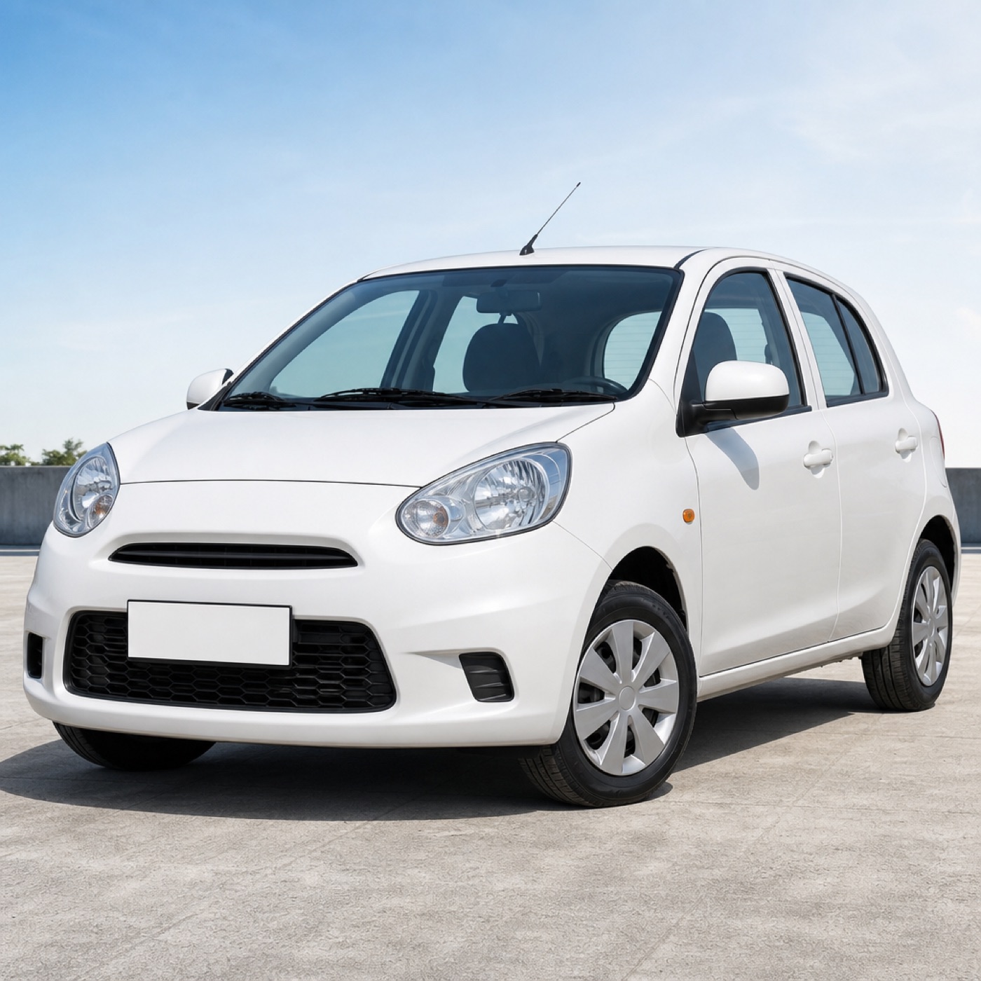 Small white economy hatchback rental car